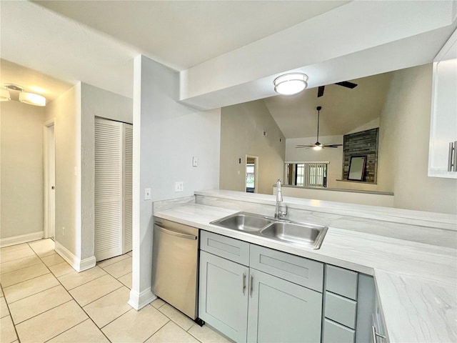 2820 NW 39th Ter, Gainesville, FL 32606 - kitchen with dishwasher, a sink, ceiling fan, light tile patterned flooring, and light countertops