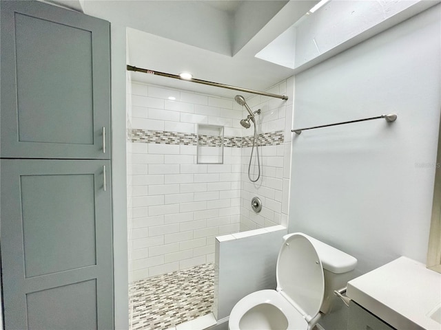 2820 NW 39th Ter, Gainesville, FL 32606 - full bathroom featuring toilet, tiled shower, and vanity