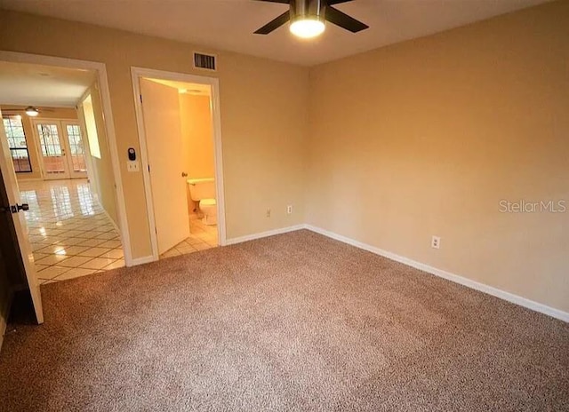 unfurnished bedroom with light carpet