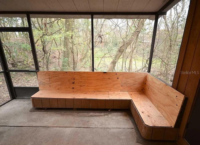 unfurnished sunroom featuring a healthy amount of sunlight