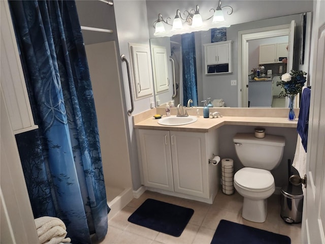 bathroom featuring walk in shower, vanity, toilet, and tile patterned flooring