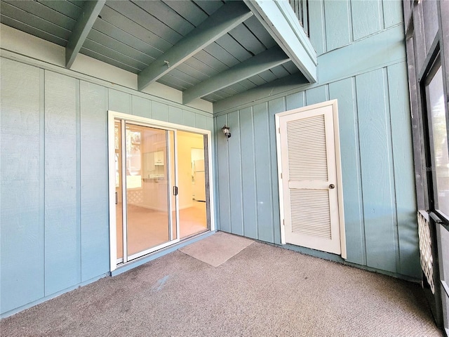 doorway to property with a patio area