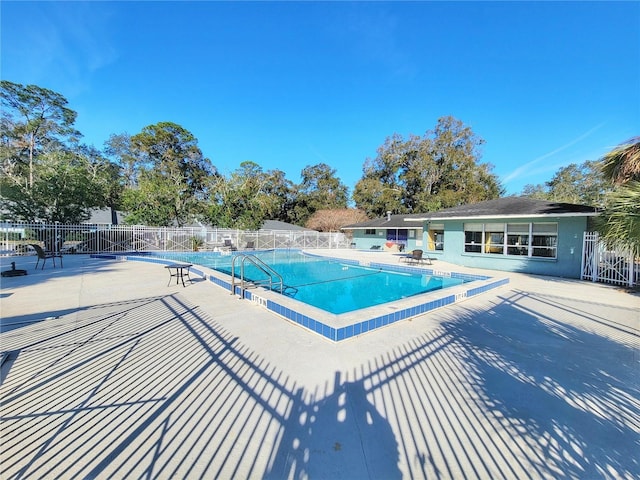 view of pool featuring a patio