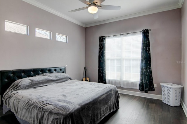 bedroom with ornamental molding, ceiling fan, and dark hardwood / wood-style flooring