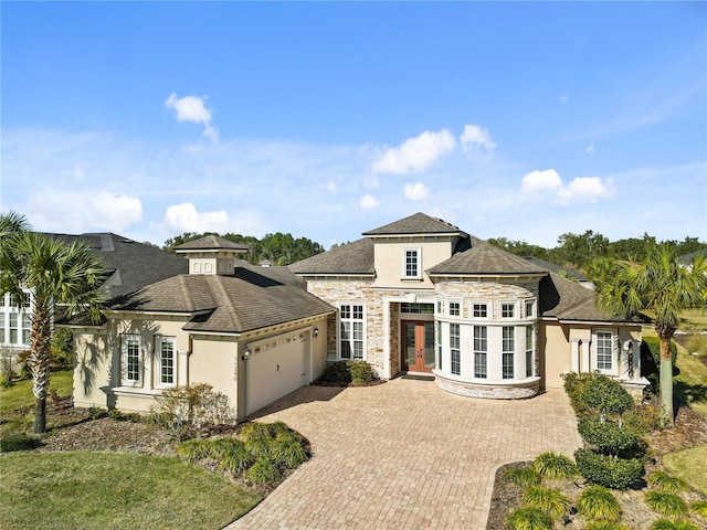 view of front of property with a garage