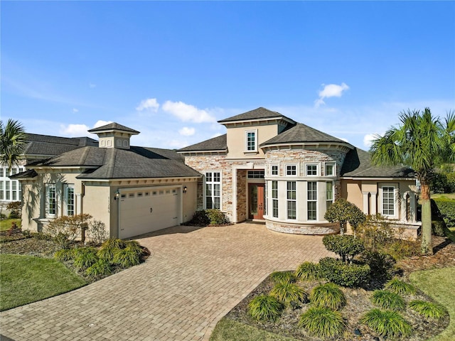 view of front of home featuring a garage and french doors