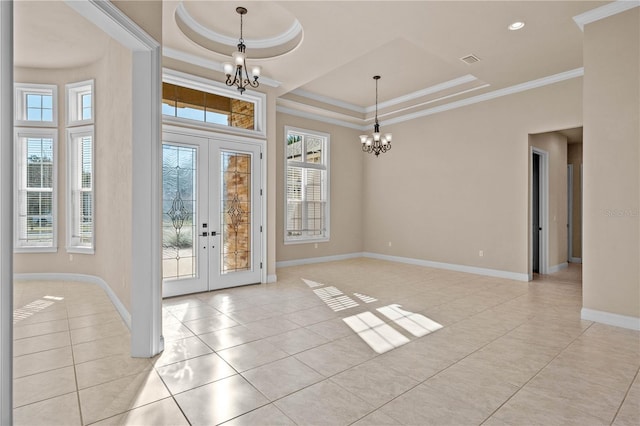 entryway with crown molding, light tile patterned flooring, an inviting chandelier, and french doors