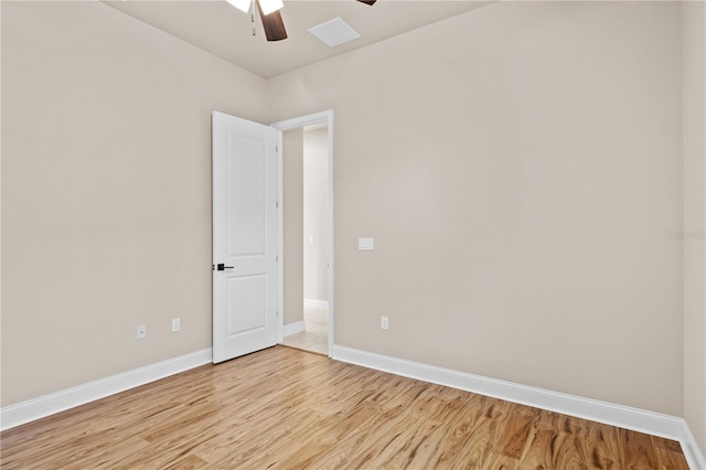 unfurnished room featuring ceiling fan and light hardwood / wood-style flooring