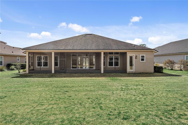 back of house featuring a yard