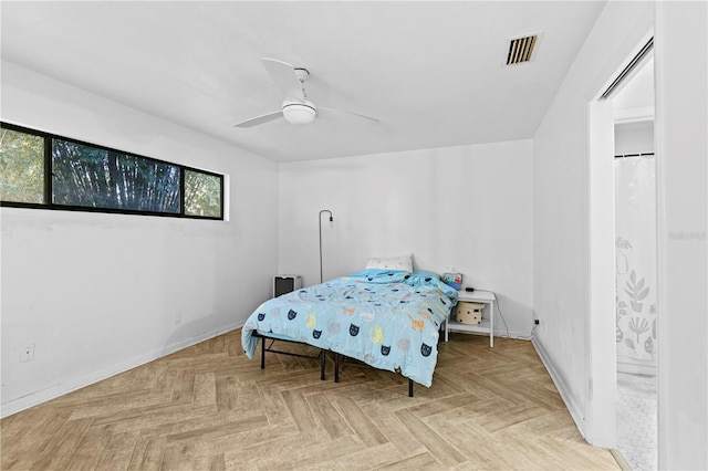 bedroom featuring light parquet floors and ceiling fan