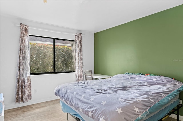 bedroom featuring light hardwood / wood-style floors