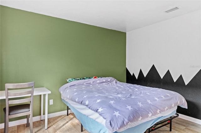 bedroom featuring light hardwood / wood-style flooring