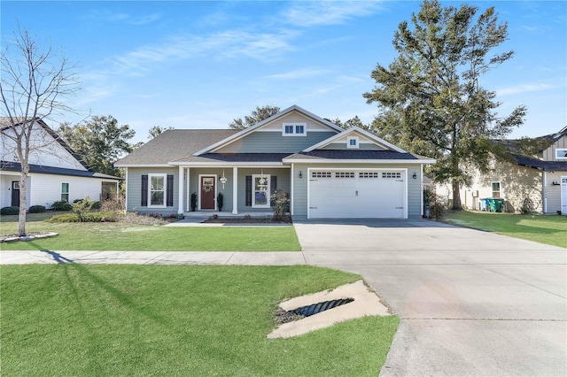 craftsman-style home with a garage and a front lawn