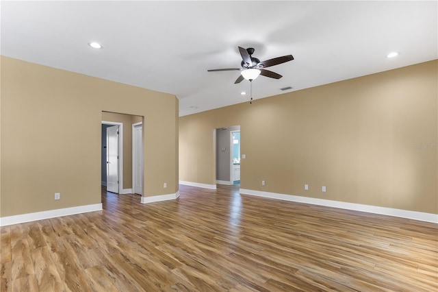 unfurnished room featuring ceiling fan and light wood-type flooring