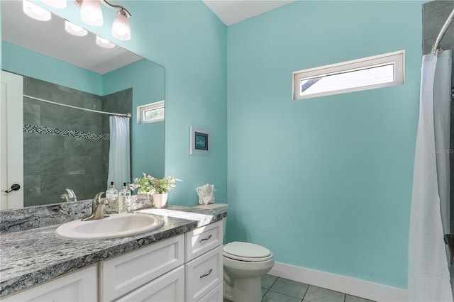 bathroom featuring vanity, curtained shower, tile patterned floors, and toilet