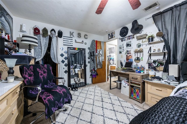 carpeted bedroom with ceiling fan