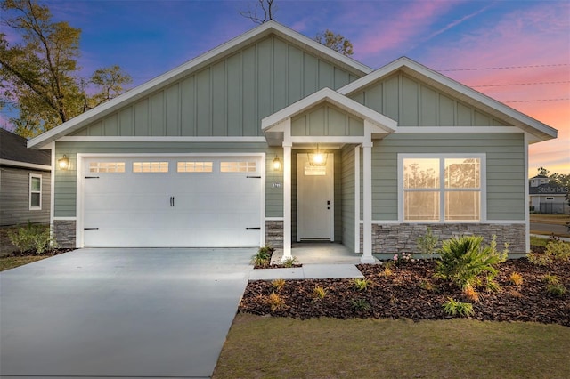 craftsman house with a garage