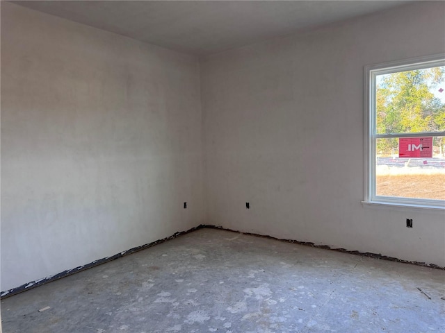 spare room with plenty of natural light