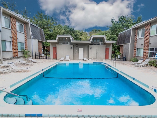 view of swimming pool featuring a patio