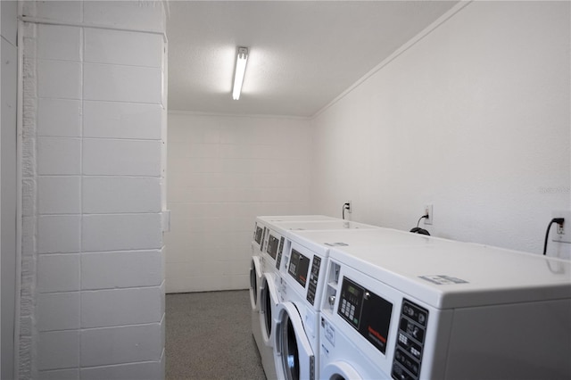 washroom with washing machine and dryer