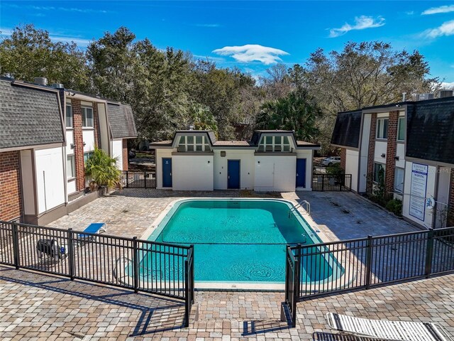 1700 SW 16th Ct Unit J-23, Gainesville, FL 32608 - community pool with fence and a patio