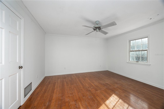 unfurnished room featuring crown molding, dark hardwood / wood-style floors, and ceiling fan