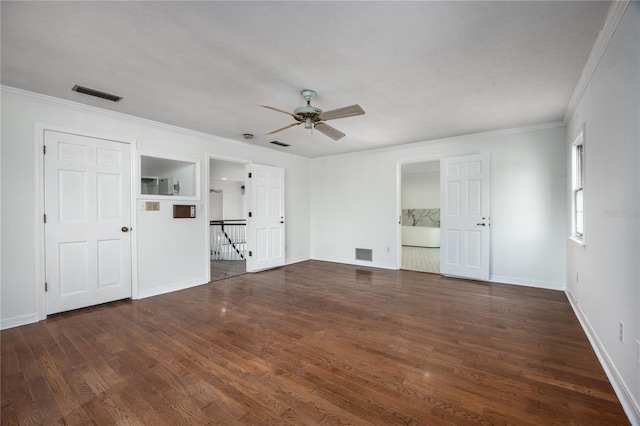 unfurnished living room featuring crown molding, dark hardwood / wood-style floors, and ceiling fan