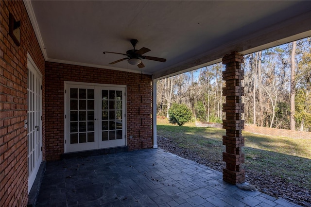 view of patio / terrace featuring french doors and ceiling fan