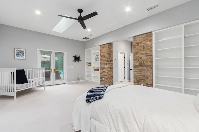 carpeted bedroom with french doors, ceiling fan, and access to outside