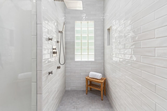 bathroom featuring tile patterned floors and a shower