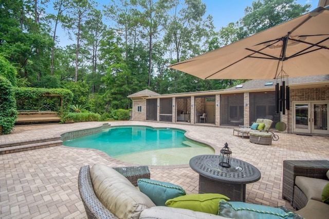 view of pool featuring an outdoor hangout area and a patio