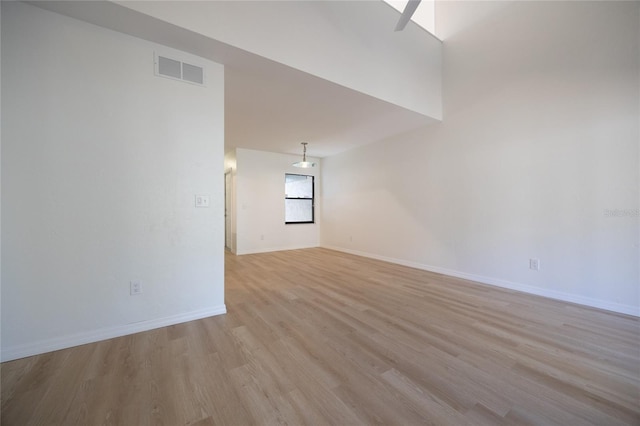 spare room featuring light hardwood / wood-style flooring