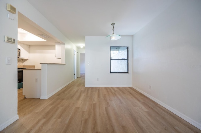 interior space with light hardwood / wood-style floors