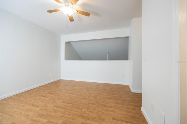 spare room with ceiling fan and light hardwood / wood-style floors