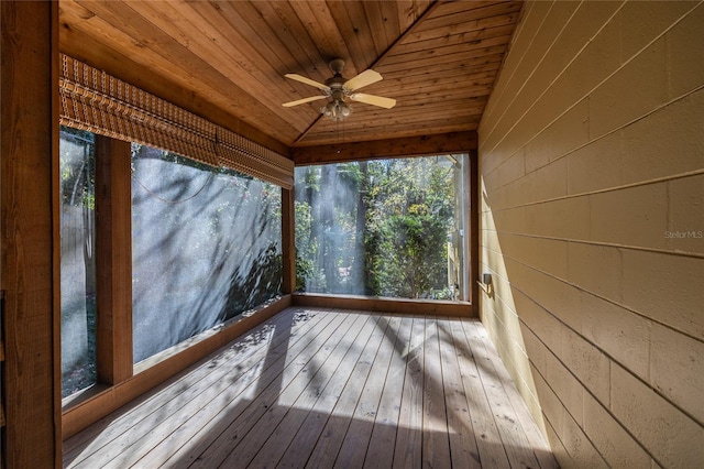 wooden deck featuring ceiling fan