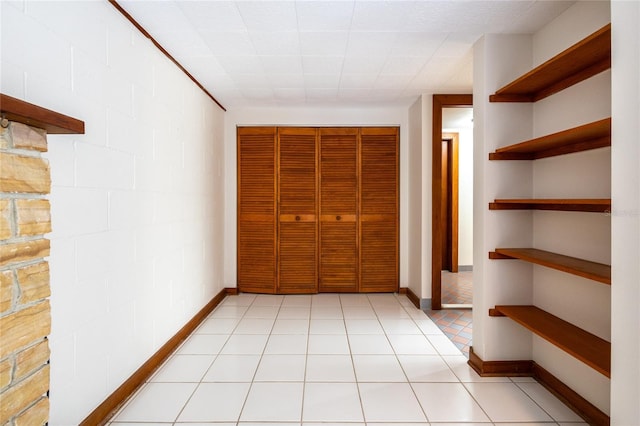 interior space with light tile patterned floors