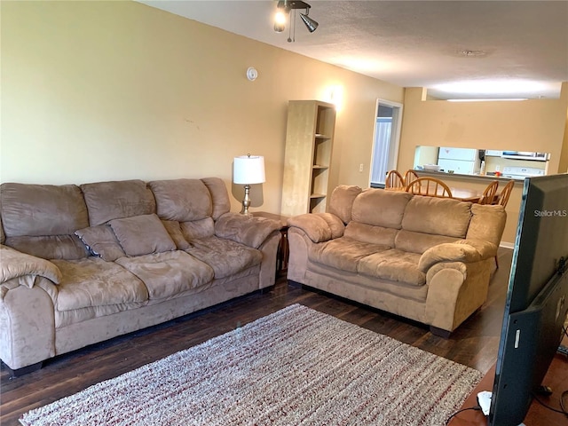 living room featuring dark hardwood / wood-style floors