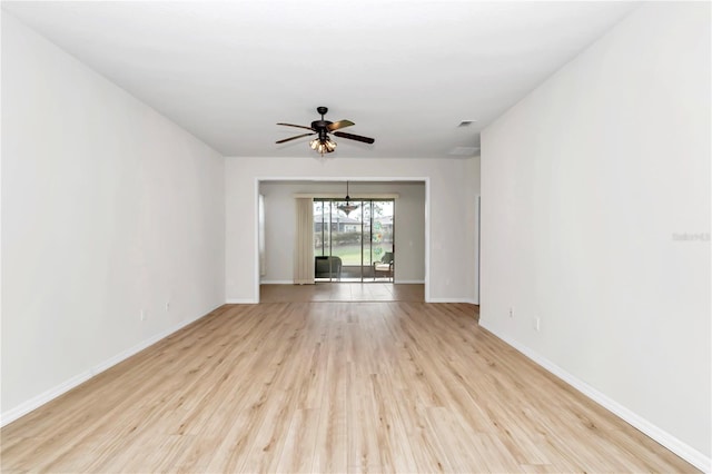 unfurnished room featuring ceiling fan and light hardwood / wood-style floors