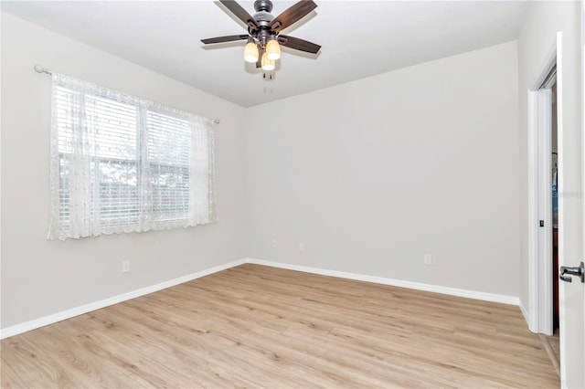 empty room featuring light hardwood / wood-style floors and ceiling fan