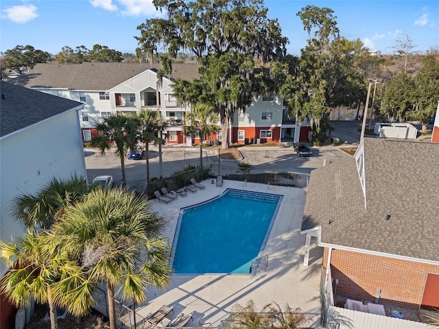 view of swimming pool with a patio area