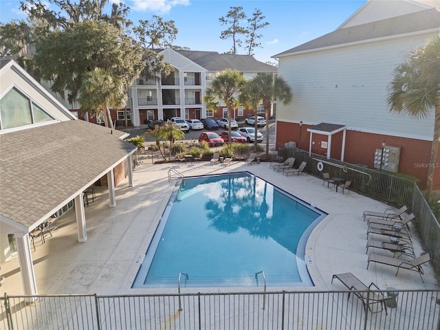 view of swimming pool featuring a patio