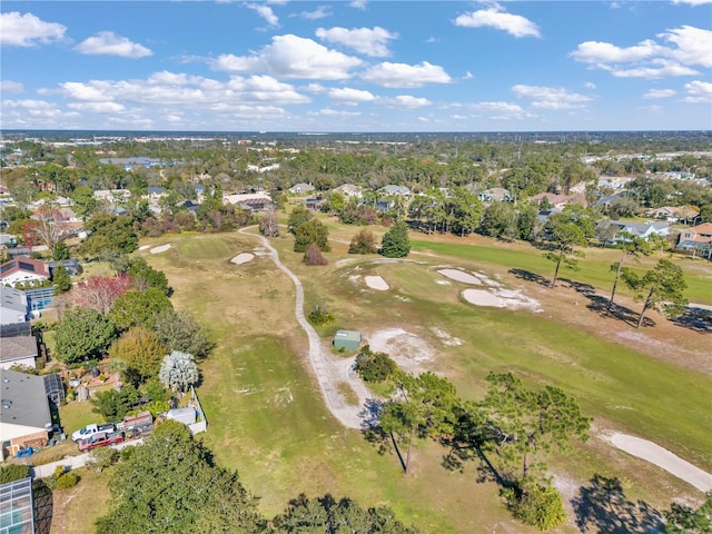 birds eye view of property featuring golf course view