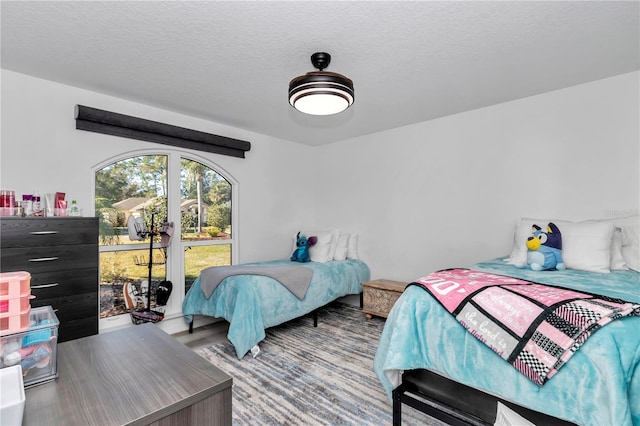 bedroom with a textured ceiling