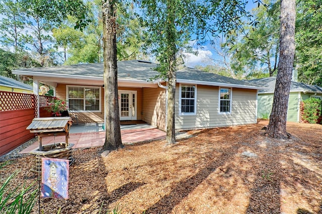 rear view of property with a deck