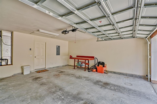 garage featuring a garage door opener and electric panel