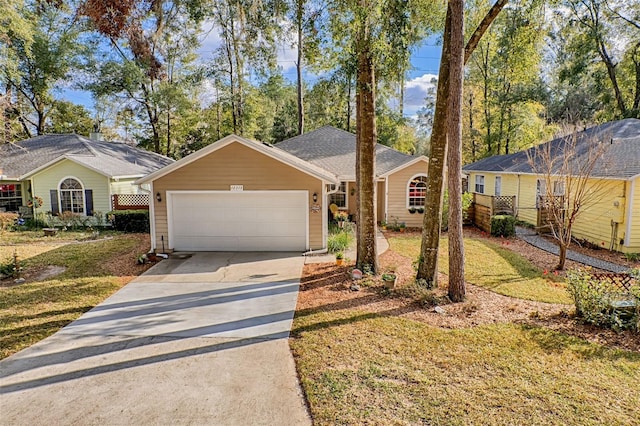 ranch-style home with a garage and a front yard