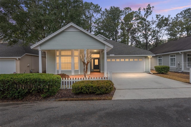 view of front of property with a garage