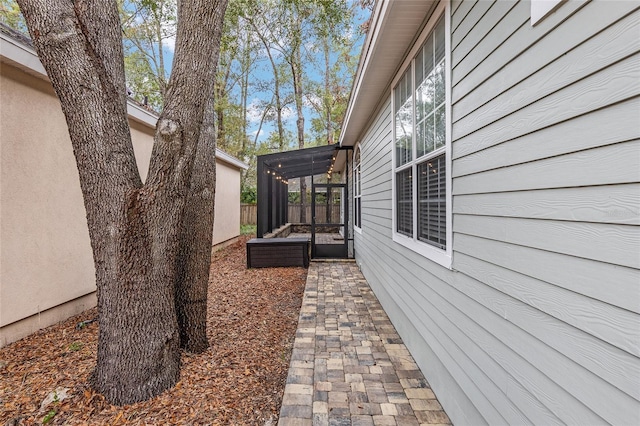 view of property exterior featuring a patio