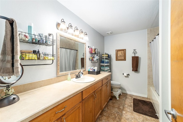 full bathroom featuring vanity, toilet, and shower / bath combo with shower curtain