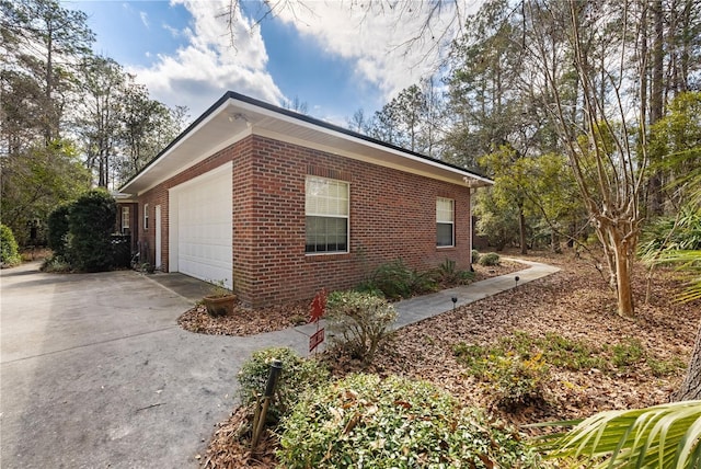 view of property exterior featuring a garage